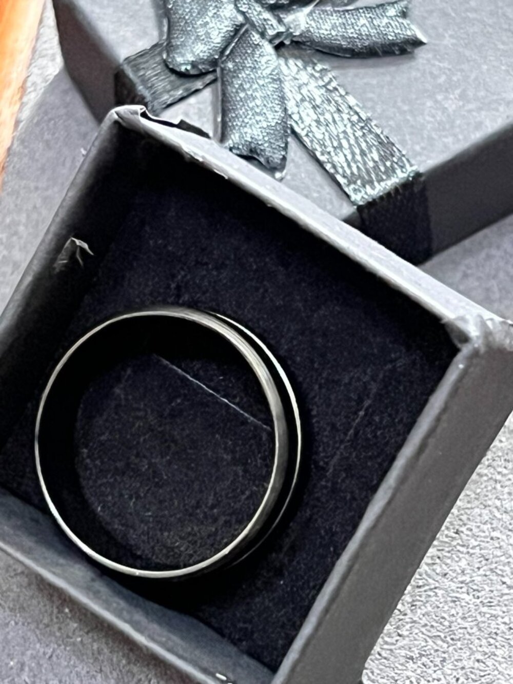 Men’s black & silver-tone wide band ring with a sleek polished finish and double
